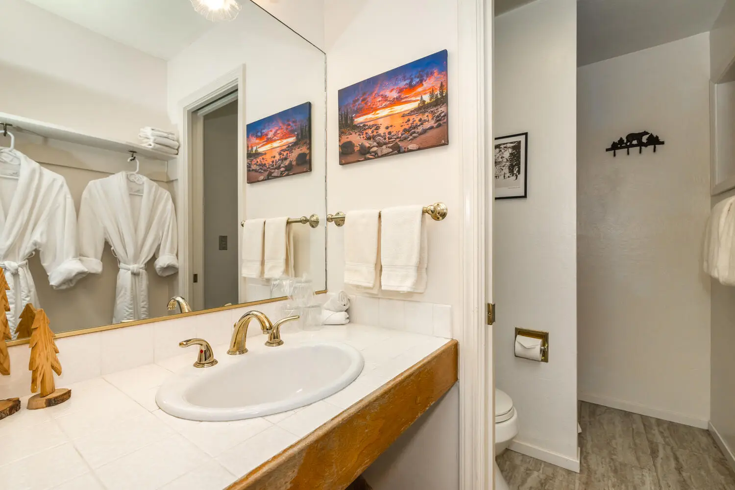 En-suite bathroom with robes