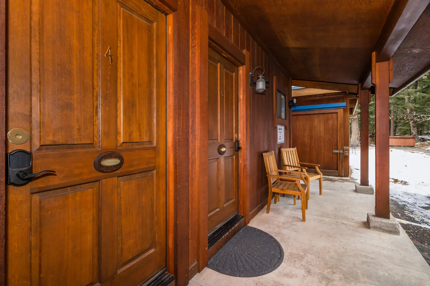 Porch chairs outside a guest room door